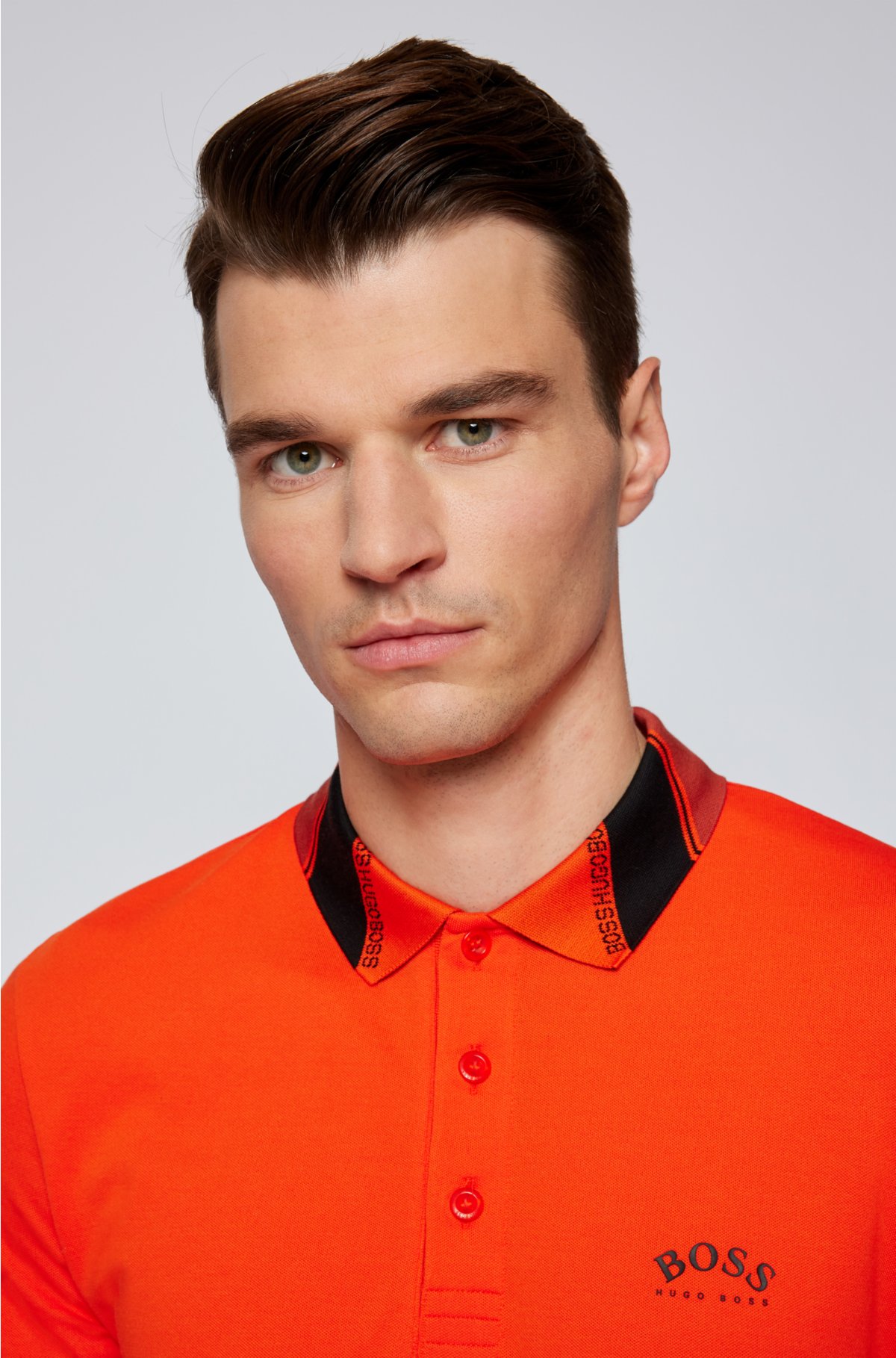 - Slim-fit polo shirt in stretch piqué with
