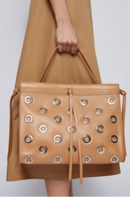 Hugo Boss Metallic-eyelet tote bag in leather with lace details. 6