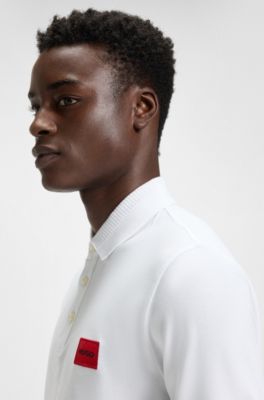 Polo slim fit de piqu&eacute; de algod&oacute;n con etiqueta con logo roja, Blanco