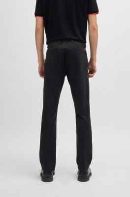 Chinos slim fit en tejido de gabardina de algod&oacute;n el&aacute;stico, Negro