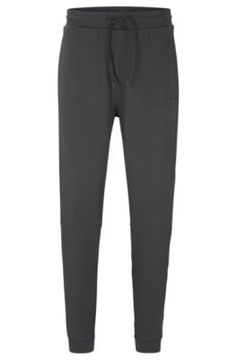 Shop Hugo Boss Cotton-terry Tracksuit Bottoms With Logo Patch In Dark Grey