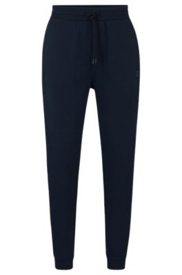 Hugo Boss Cotton-terry Tracksuit Bottoms With Logo Patch In Dark Blue