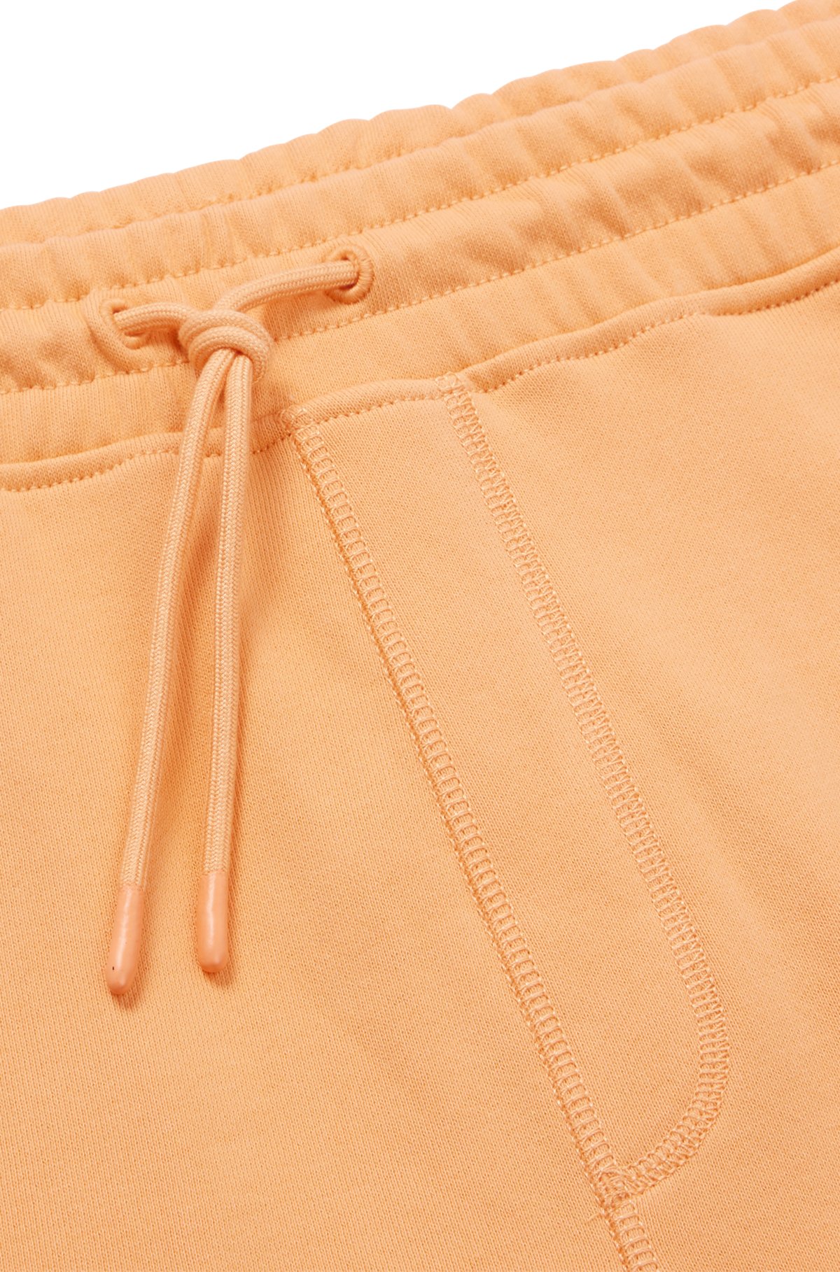 Drawstring shorts in French terry cotton with logo patch, Light Orange