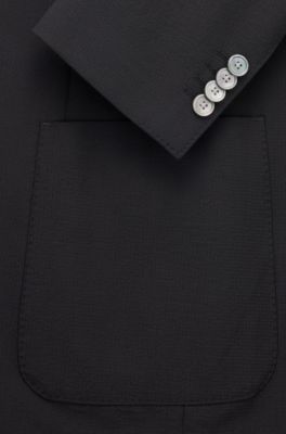 Traje slim fit en sirsaca el&aacute;stica, Negro