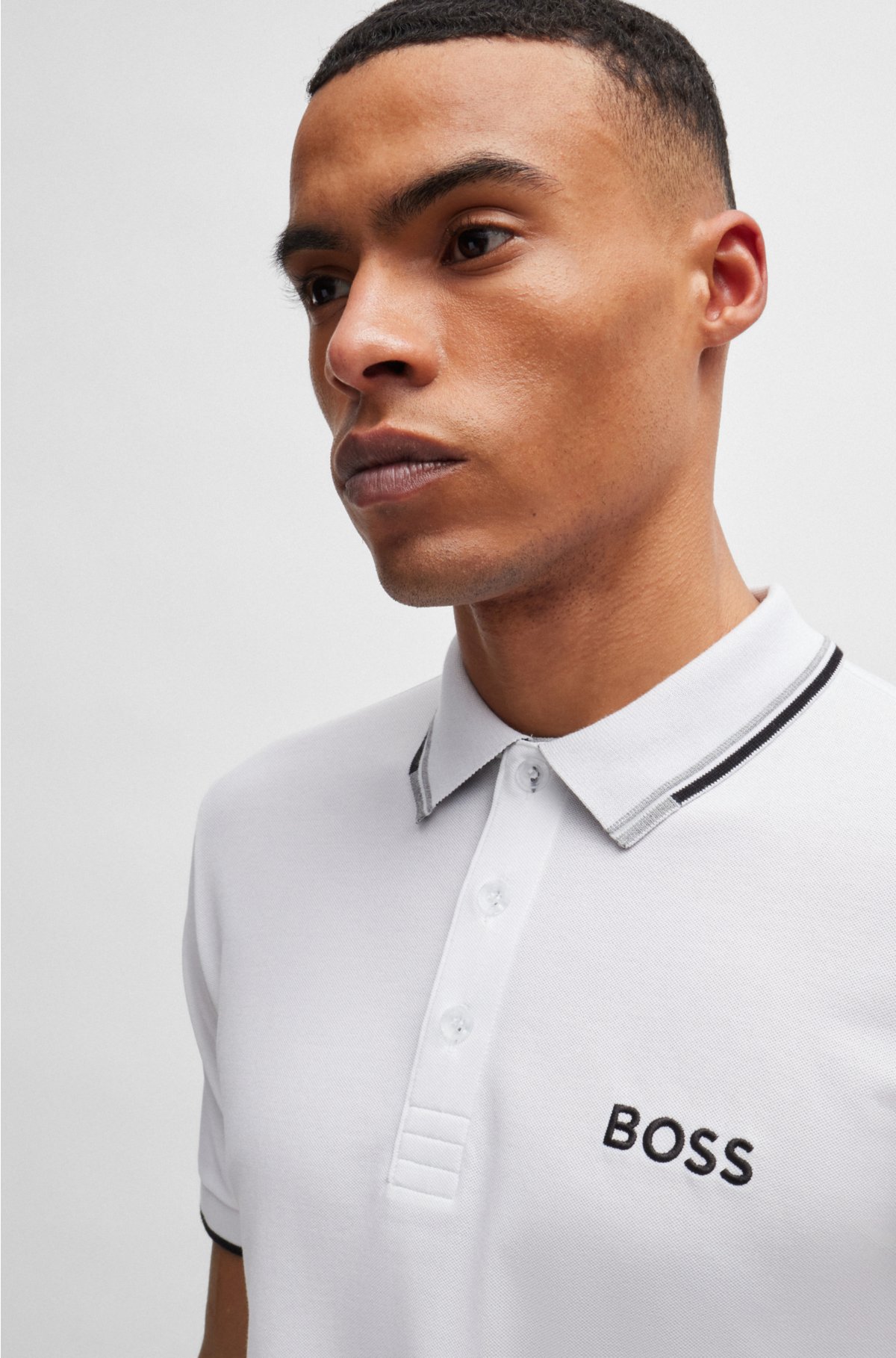 - Polo BOSS shirt with logos contrast
