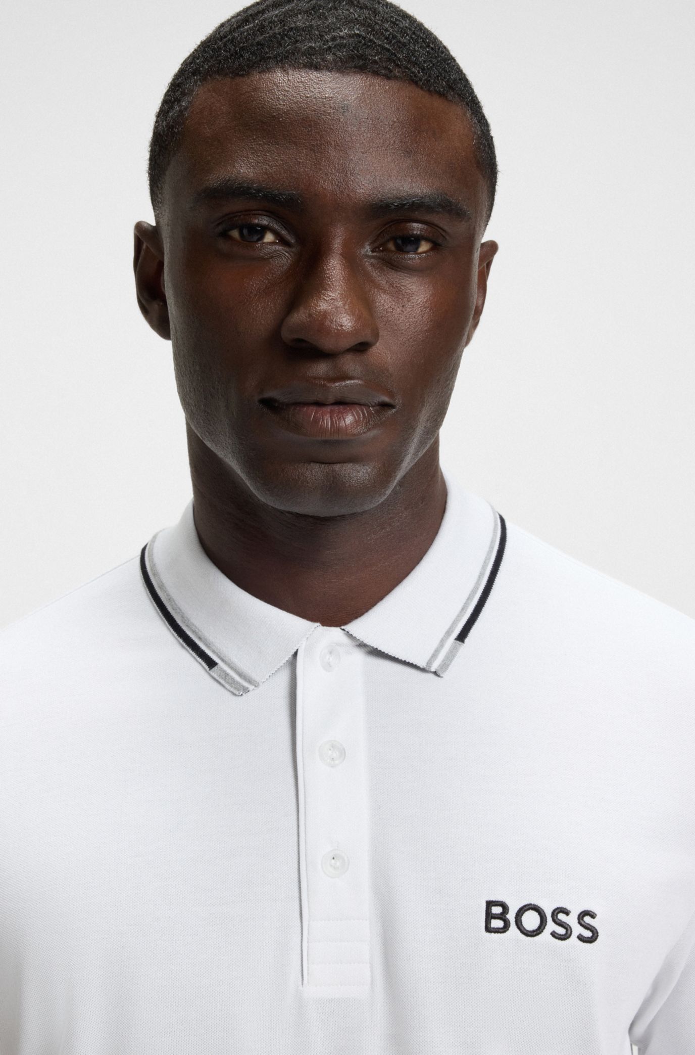 不*火様 TRVO WHITE LUNAR DUST POLO BOSS - Active Paddy regular-fit polo shirt in quick-dry stretch