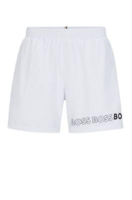 Shop Hugo Boss Swim Shorts With Repeat Logos In White
