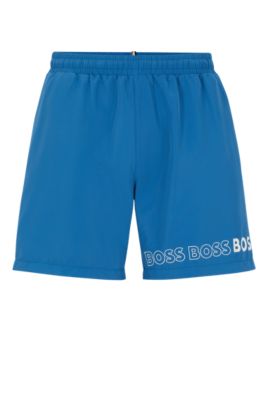 Shop Hugo Boss Swim Shorts With Repeat Logos In Blue