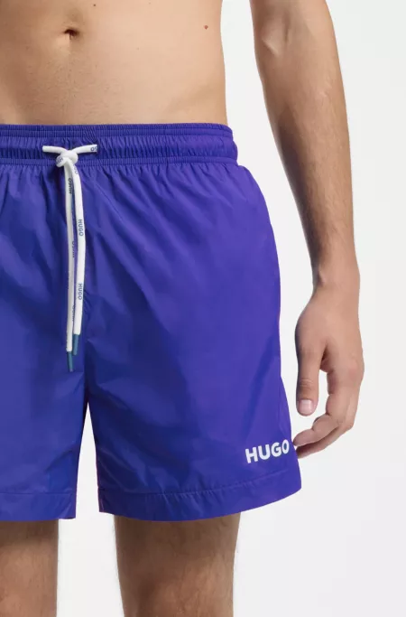 Swim shorts with contrast logo print