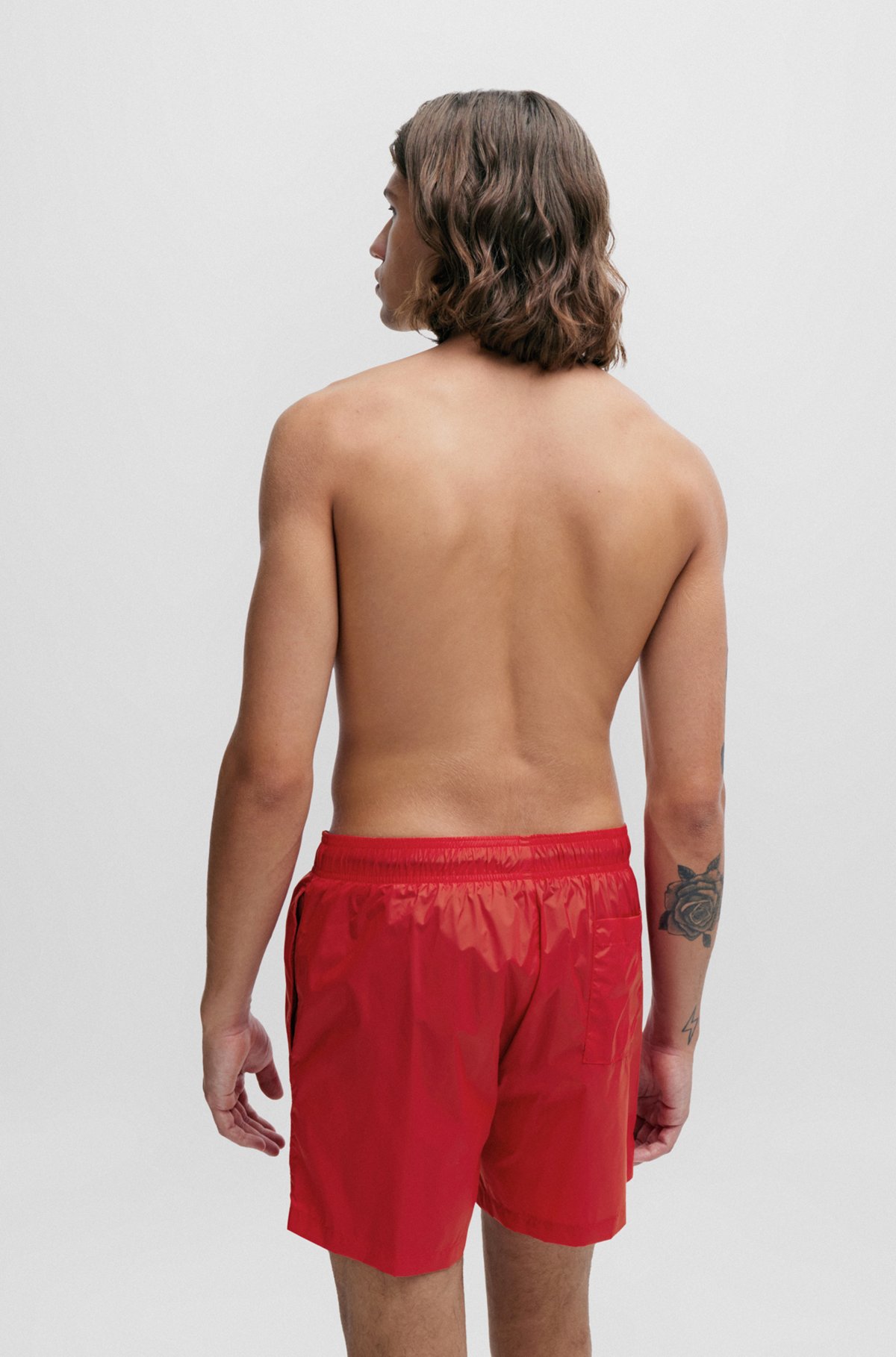 Quick-dry swim shorts with logo print, light pink