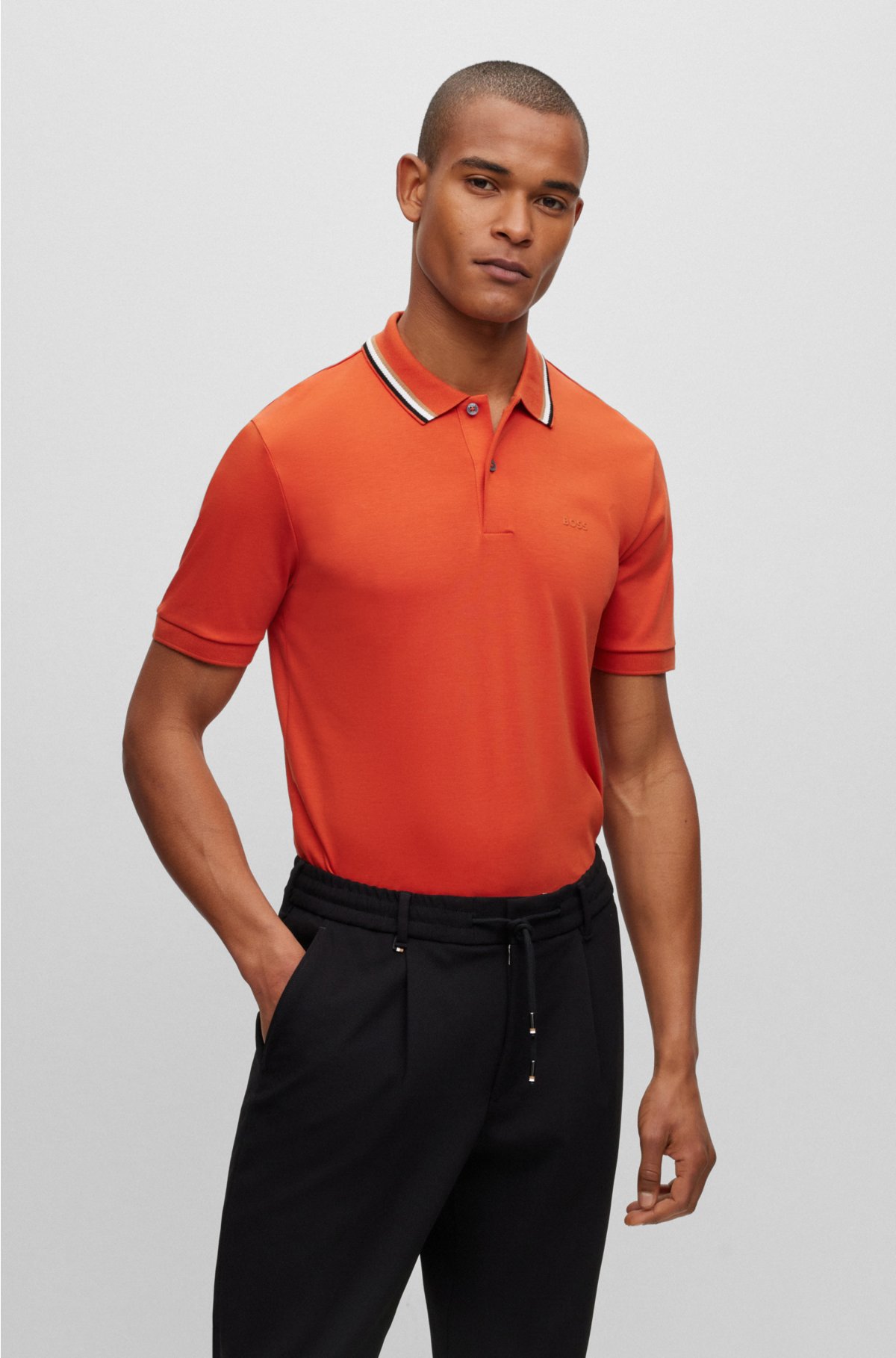 - Slim-fit polo with striped collar