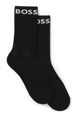 Paquete de dos pares de calcetines de tejido el&aacute;stico de largo normal, Negro