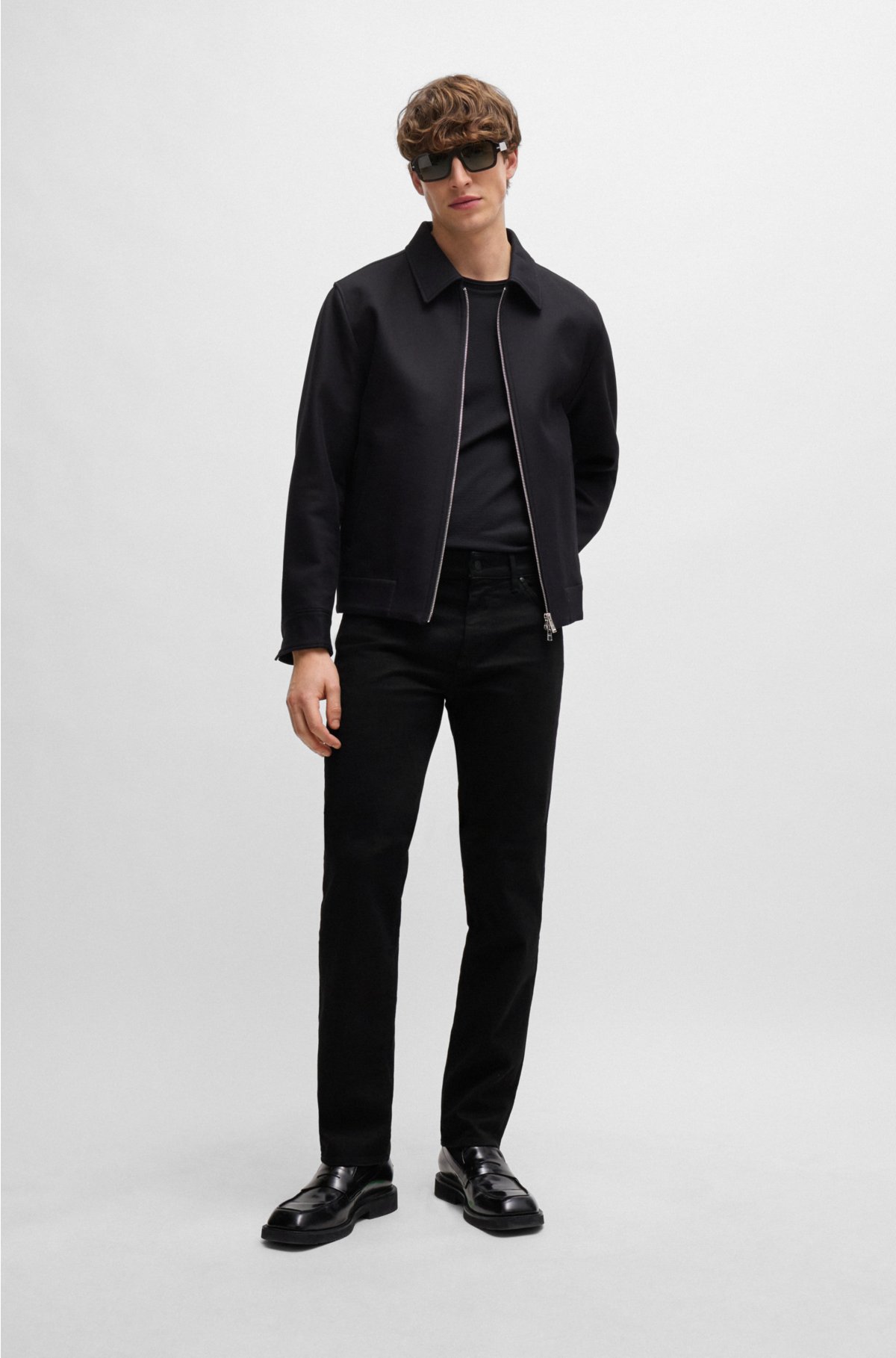 BOSS - Relaxed-fit jeans in black rigid denim