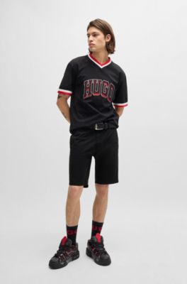 Shorts chinos slim fit de tejido de gabardina de algod&oacute;n el&aacute;stico, Negro