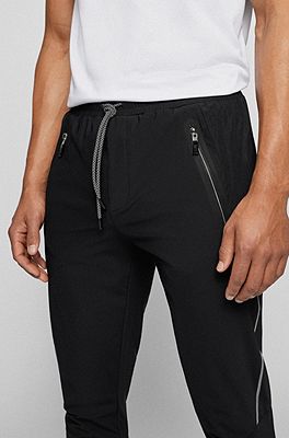 BOSS - Regular-fit trousers in lightweight technical-stretch jersey