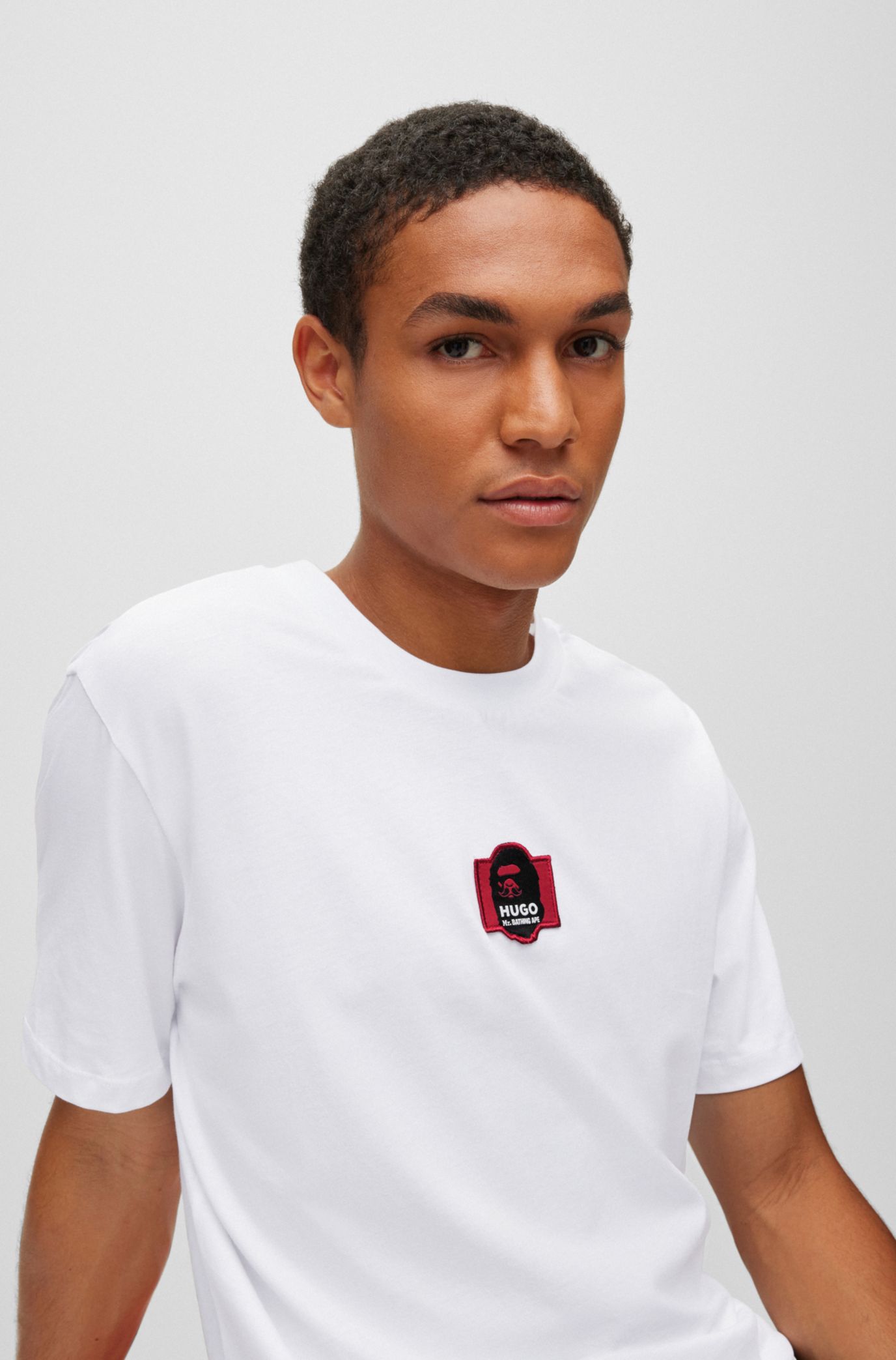 HUGO - Cotton-jersey regular-fit T-shirt with collaborative artwork