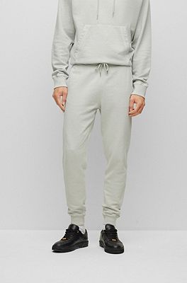 HUGO - Cuffed tracksuit bottoms in French terry with contrast logo
