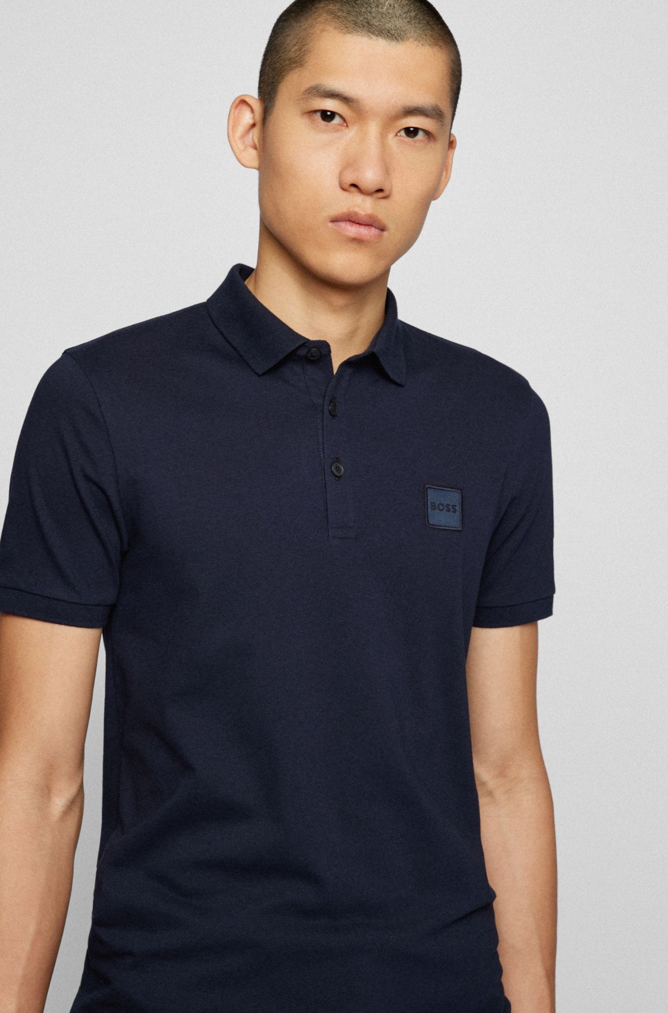 BOSS - Stretch-cotton slim-fit polo shirt with logo patch