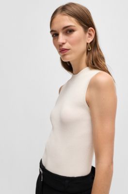 Sleeveless mock-neck top with ribbed structure