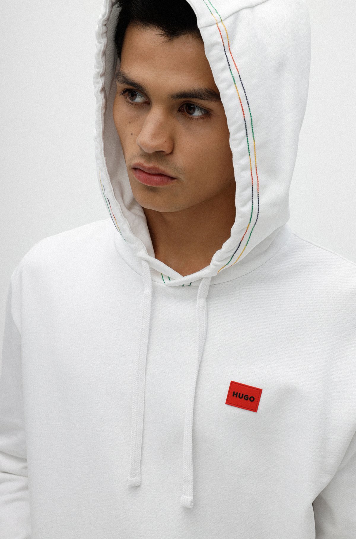 HUGO - Relaxed-fit hoodie in cotton with multi-colored slogan