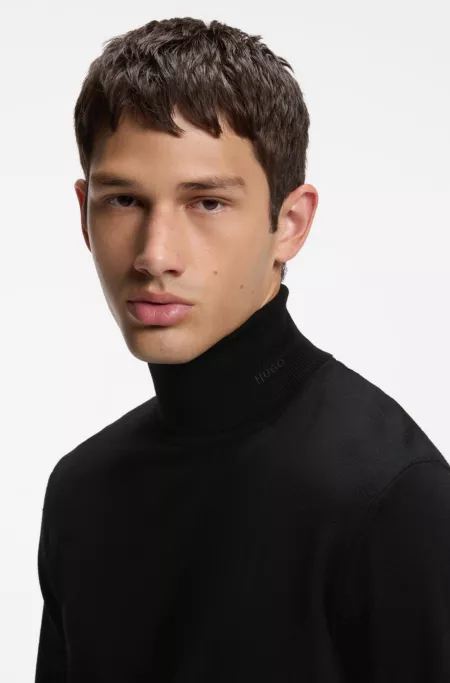 Merino wool turtleneck sweater with embroidered logo