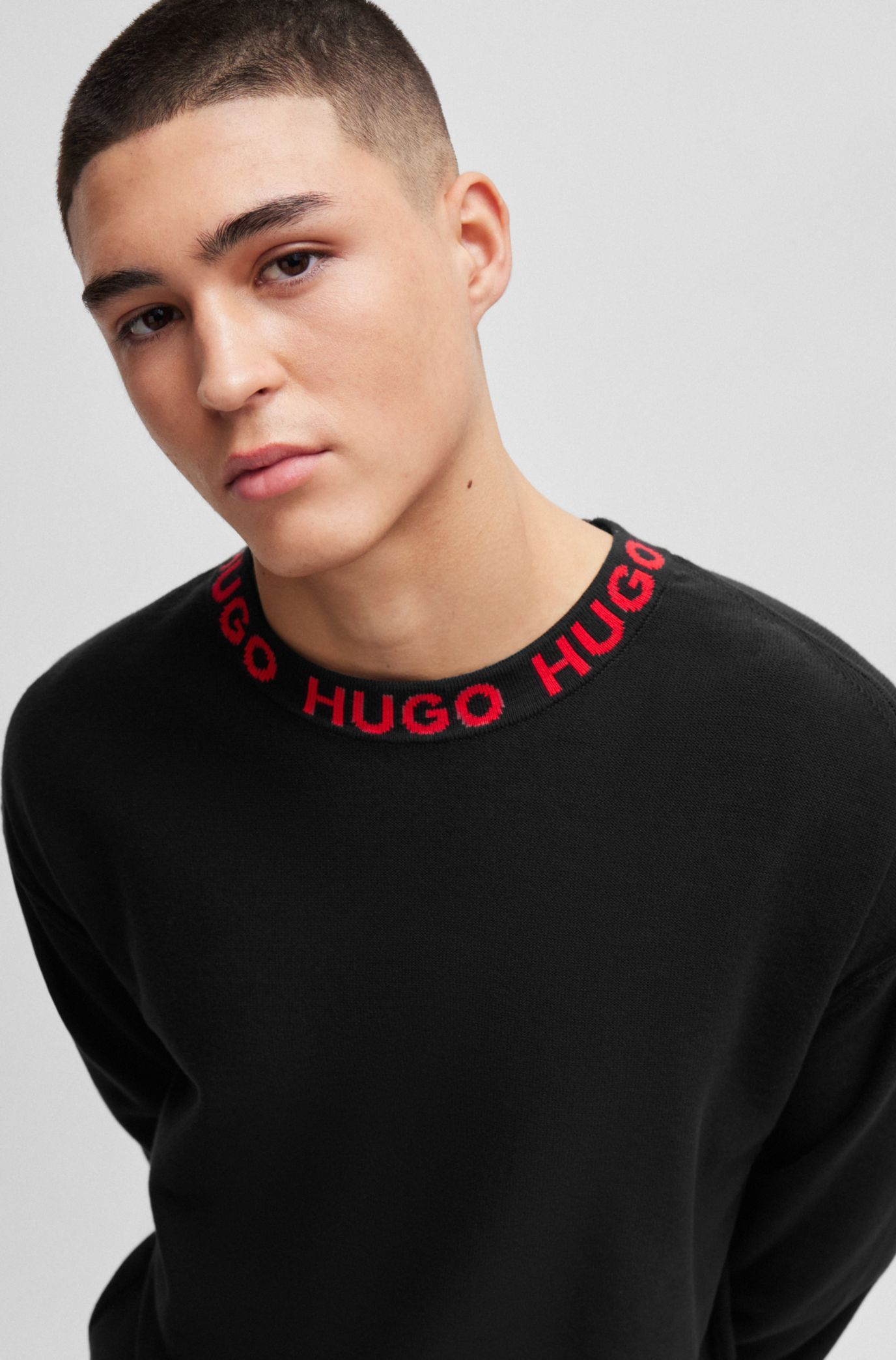 HUGO - Oversize-fit sweater in with logo collar