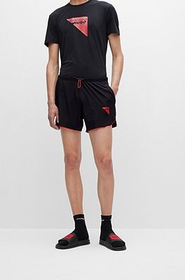 HUGO - Super-stretch shorts capsule with piping and logo