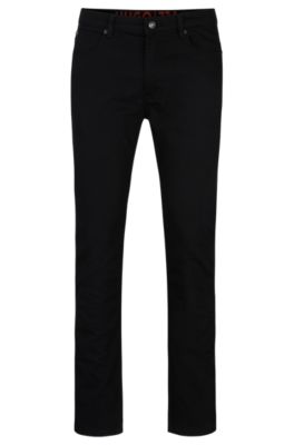 Vaqueros extra slim fit de c&oacute;modo denim el&aacute;stico, Negro