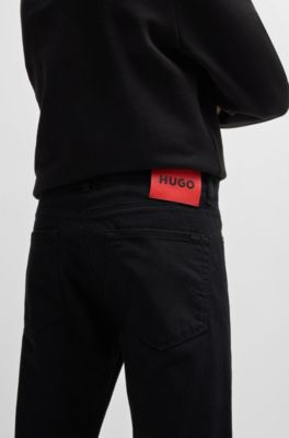 Vaqueros extra slim fit de c&oacute;modo denim el&aacute;stico, Negro