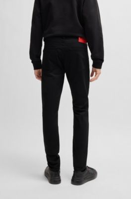 Vaqueros extra slim fit de c&oacute;modo denim el&aacute;stico, Negro