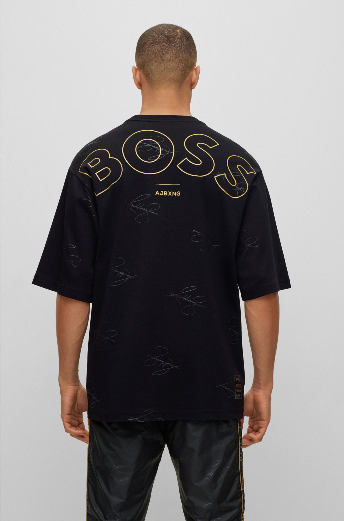 BOSS - BOSS x AJBXNG interlock-cotton T-shirt with collaborative branding  and signatures