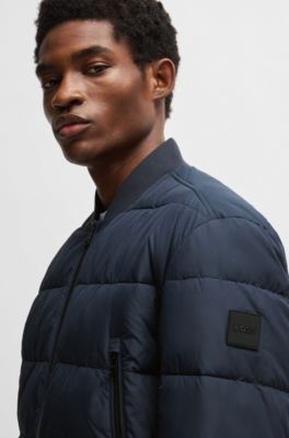 BOSS - Water-repellent padded jacket with logo badge - Dark Blue