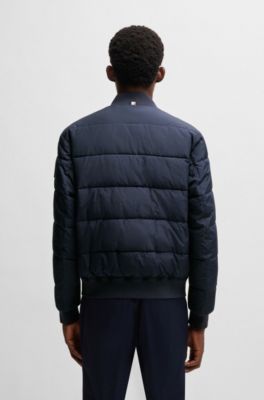 BOSS - Water-repellent padded jacket with logo badge - Dark Blue