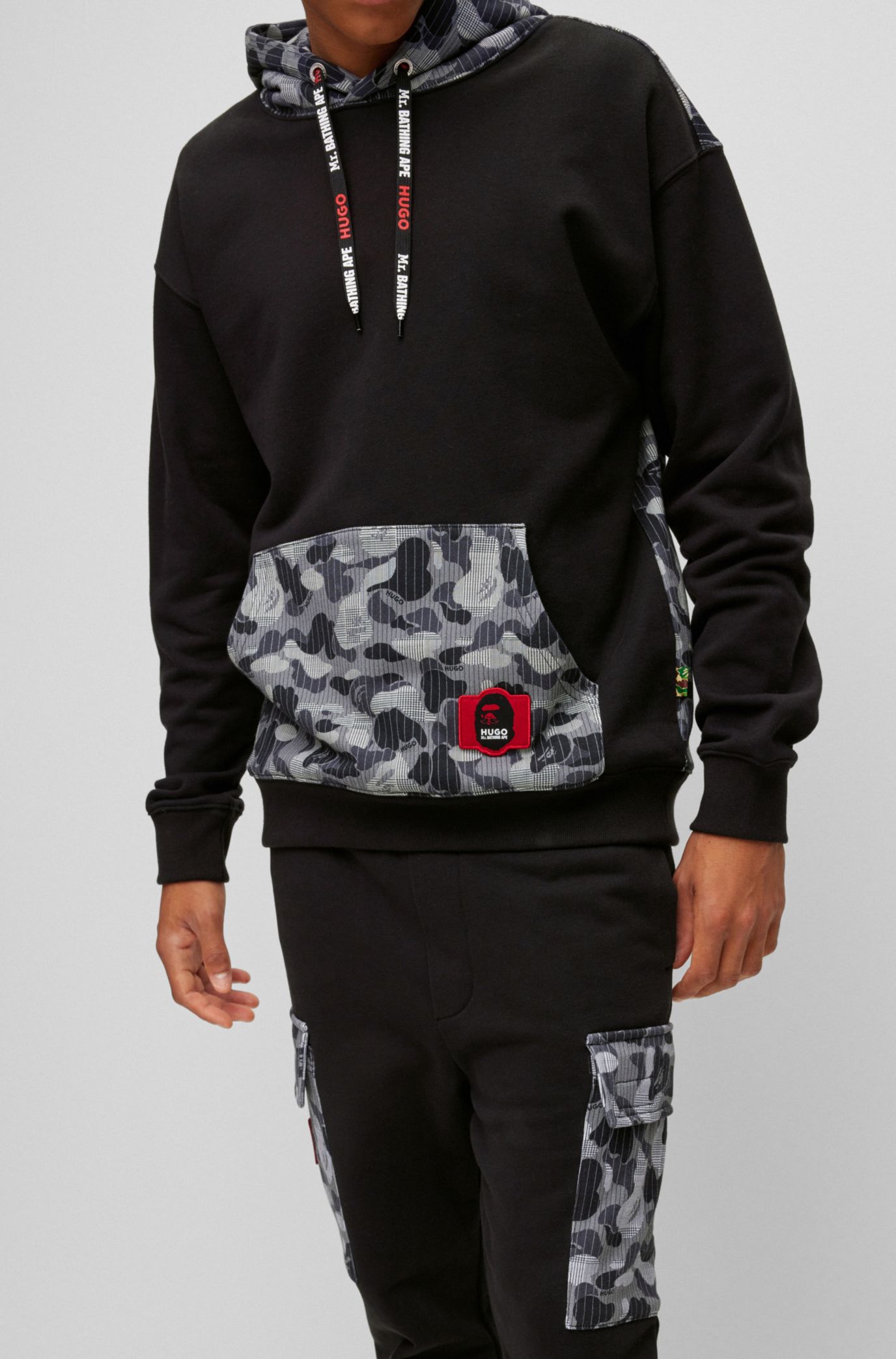 Cotton-jersey hoodie with camouflage pattern and collaborative branding