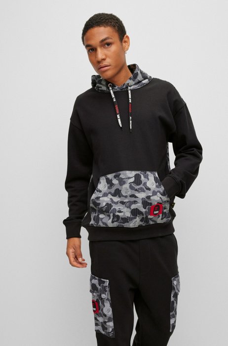 HUGO - Cotton-jersey tracksuit bottoms with camouflage pattern