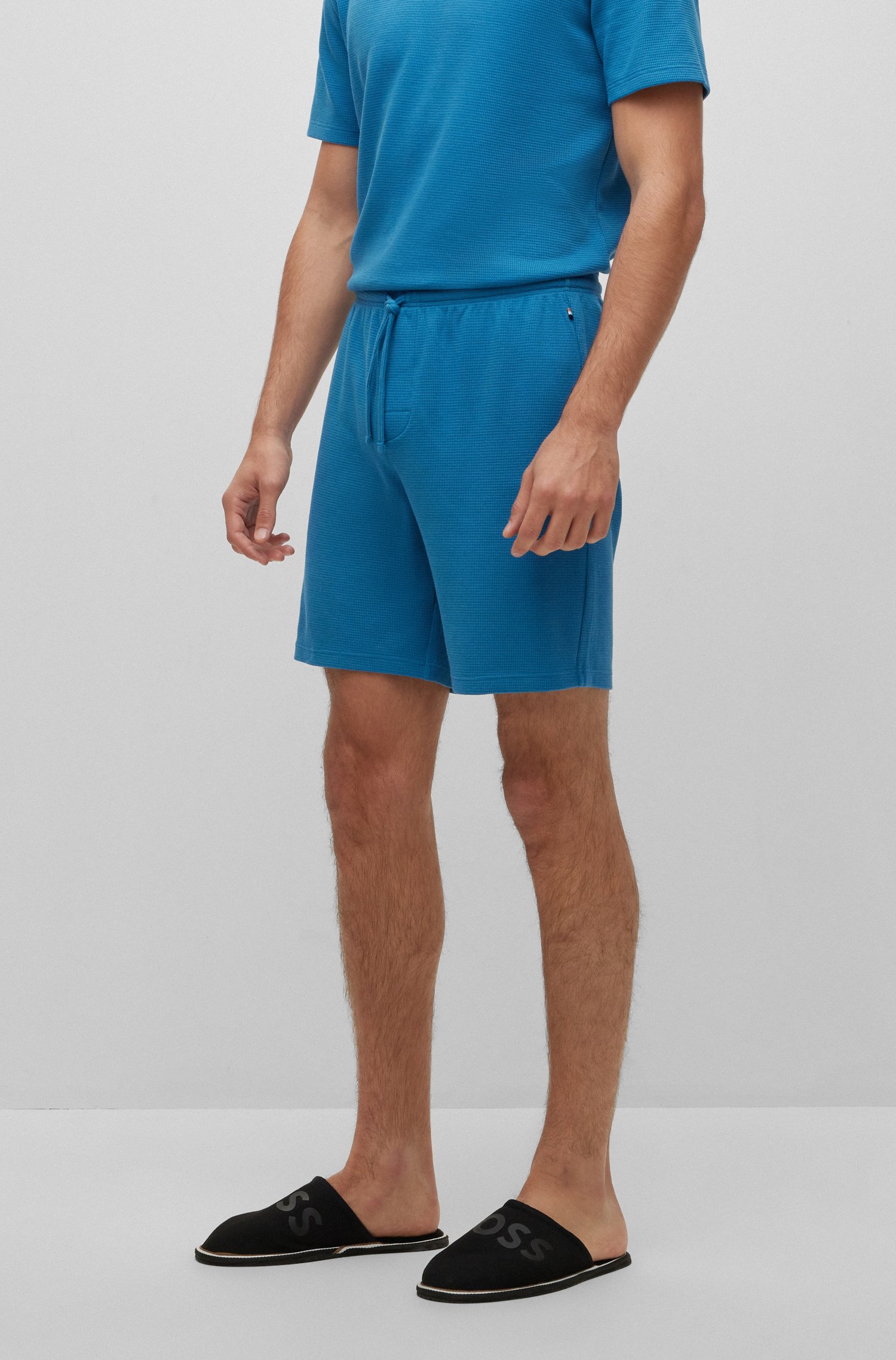 Shorts de pijama con estructura rejilla y logo bordado