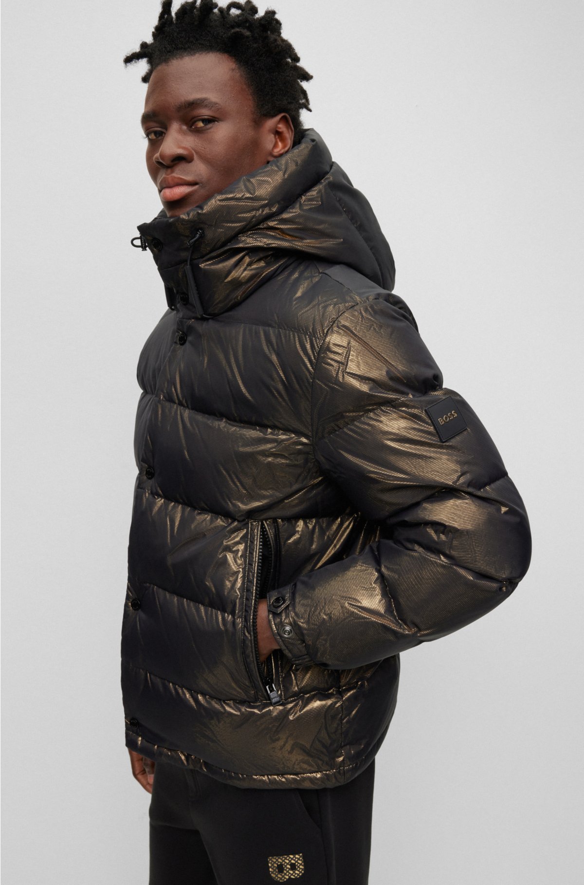 Water-repellent down jacket with monogram badge and lining