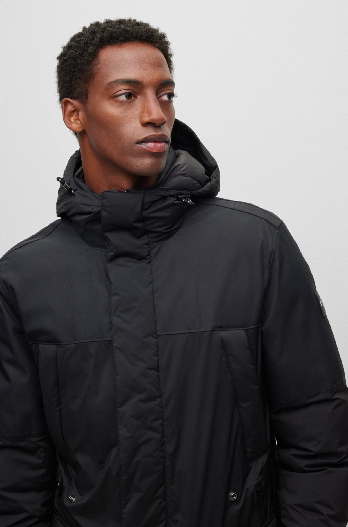 BOSS - Mixed-material hooded jacket with water-repellent finish