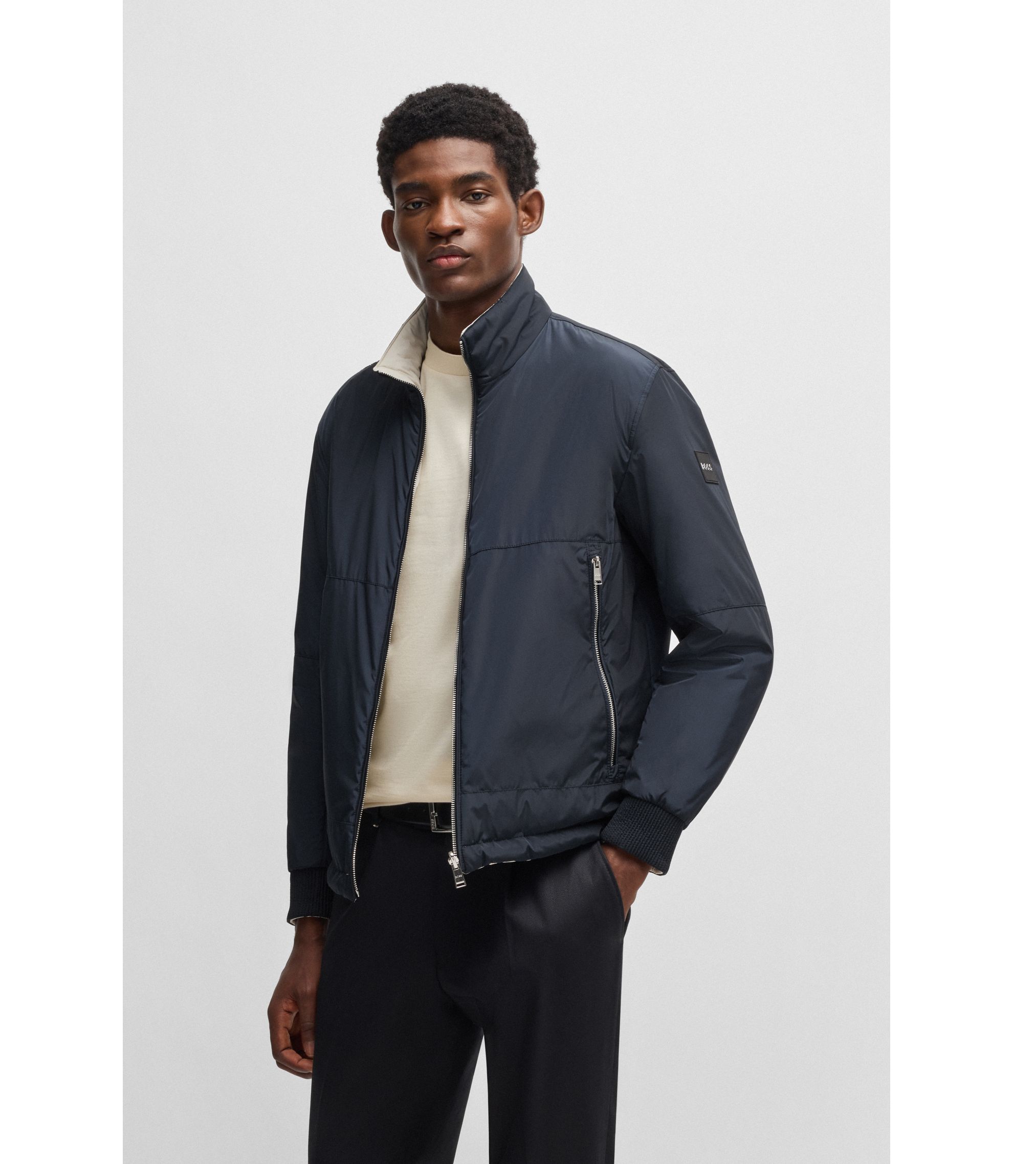 BOSS - Water-repellent reversible jacket with logo badge - Dark Blue