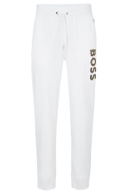 BOSS - Cuffed tracksuit bottoms in French terry with logo print