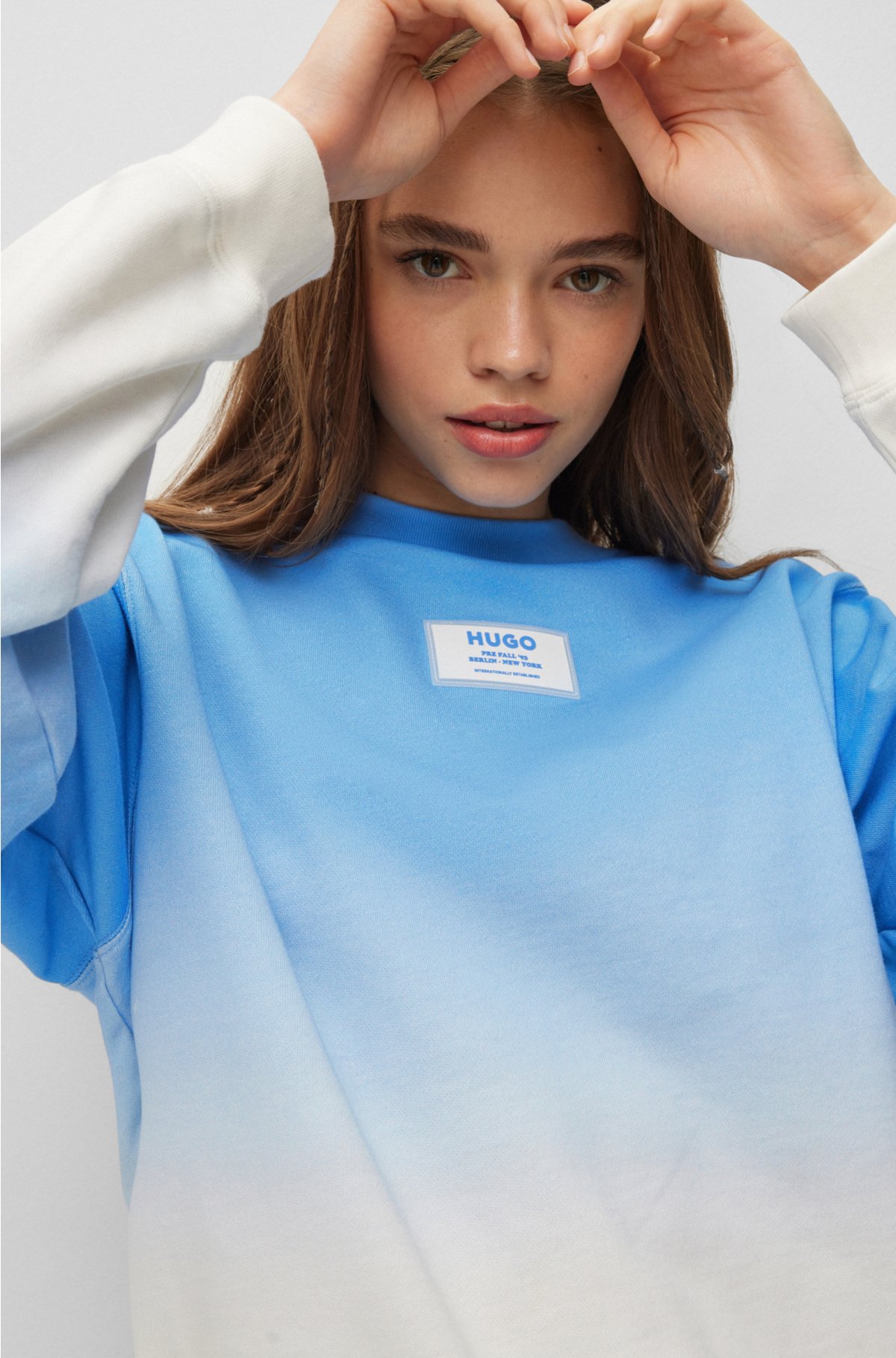 HUGO - Zip-neck sweatshirt in French terry with dalmatian print