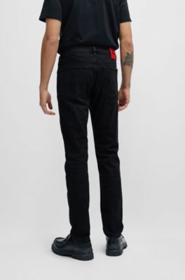 Vaqueros extra slim fit de denim el&aacute;stico negro de gran comodidad, Negro