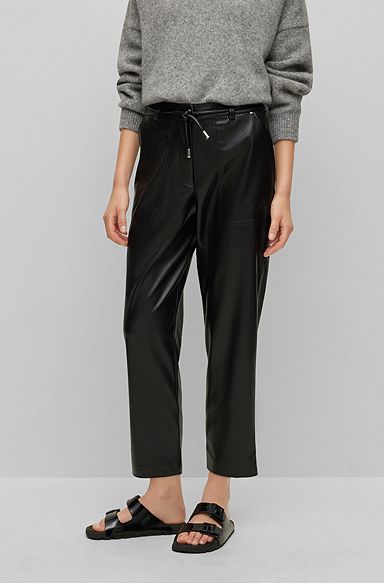Tapered-fit cropped trousers in faux leather, Black