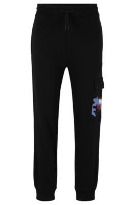 Hugo Boss Cotton-terry Tracksuit Bottoms With Camouflage Artwork In Black