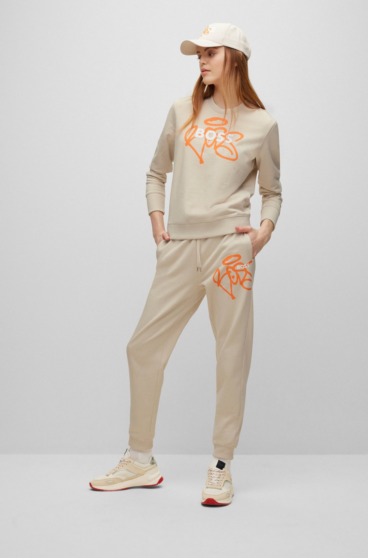 BOSS - Cotton-terry tracksuit bottoms with graffiti-style artwork