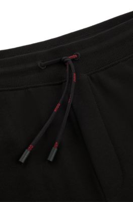 Bas de surv&ecirc;tement en molleton de coton avec logo, Noir