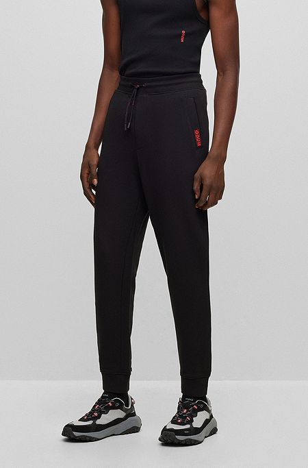 Cotton-terry tracksuit bottoms with logo detail, Black