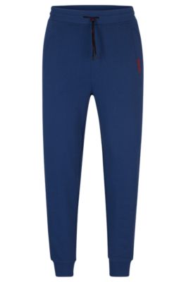 HUGO - Cotton-terry tracksuit bottoms with logo detail