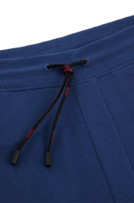 Bas de surv&ecirc;tement en molleton de coton avec logo, Bleu