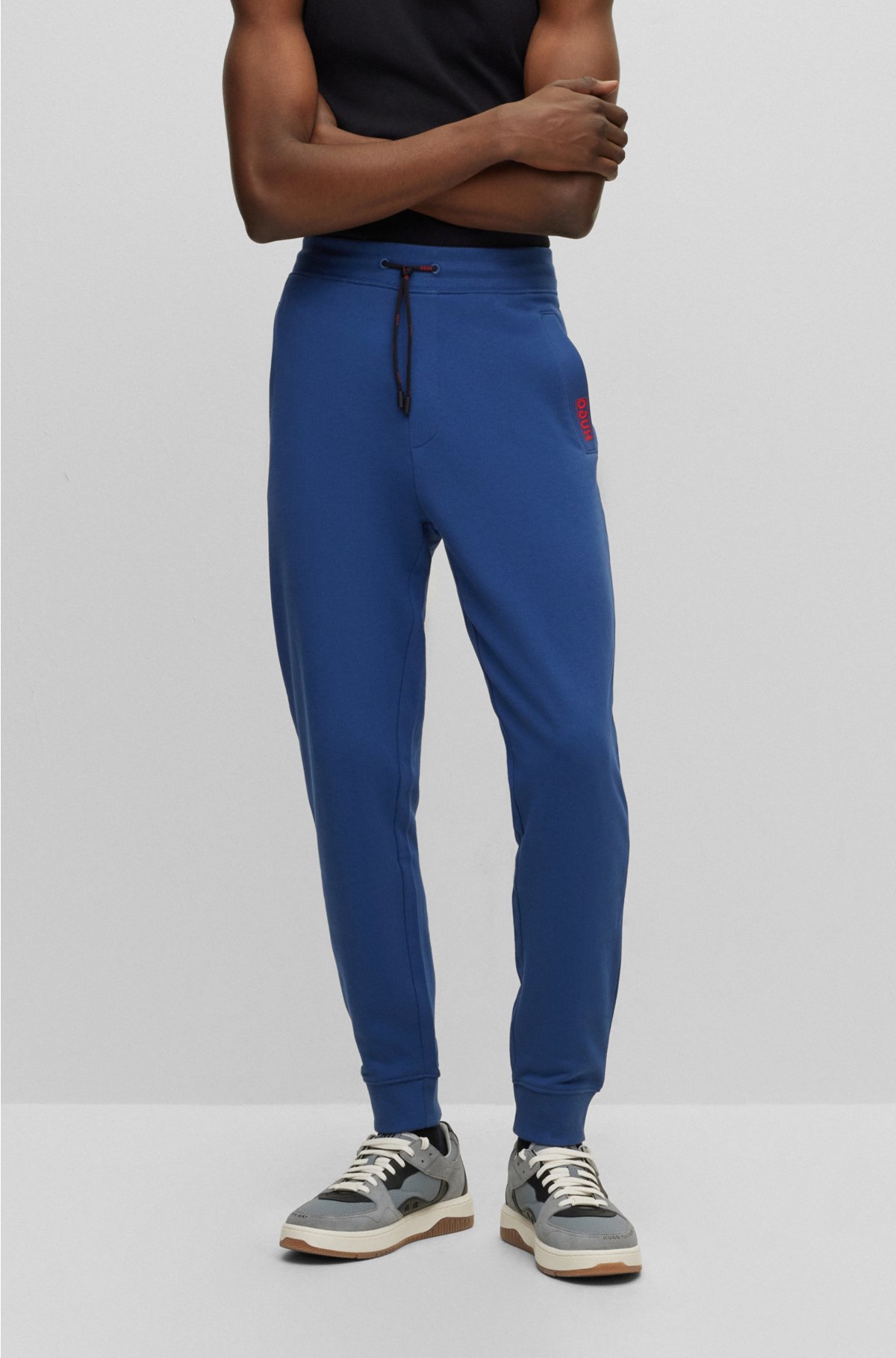 HUGO - Cotton-terry tracksuit bottoms with logo detail